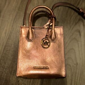 NWOT small rose gold Michael Kors purse with adjustable strap